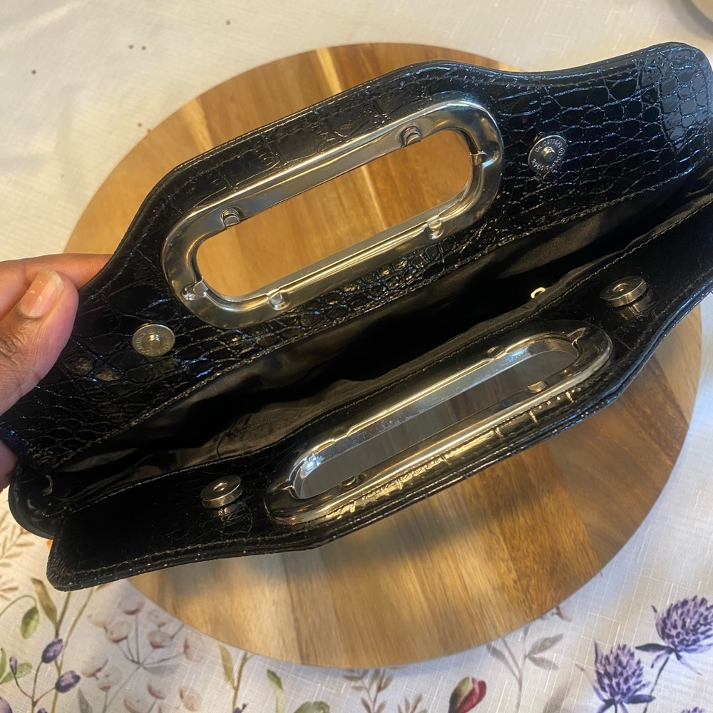 Timeless Black Leather Wristlet with Sleek Finish